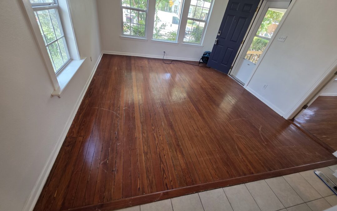How Do Professional Cleaners Clean Hardwood Floors Safely?